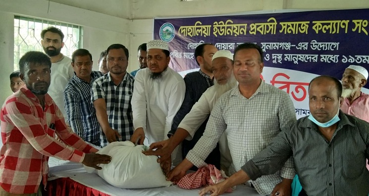 দোয়ারায় প্রবাসী সমাজ কল্যাণ সংগঠনের উদ্যোগে খাদ্য সামগ্রী বিতরণ