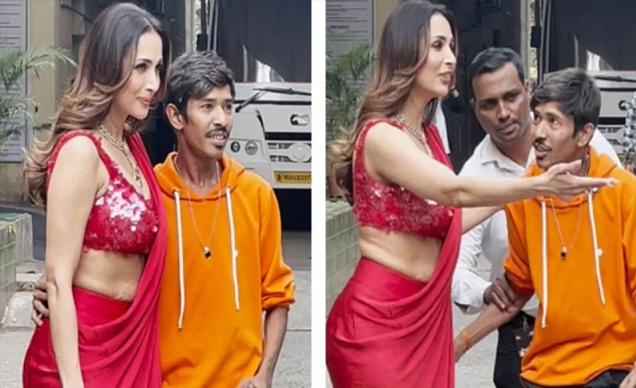 ছবি তুলতে এসে মালাইকার কোমরে হাত, কী করলেন অভিনেত্রী?
