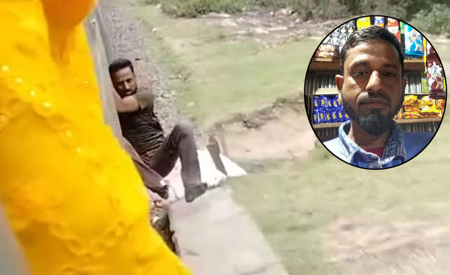 ভাইরাল ভিডিও : জোরপূর্বক ট্রেনে ঝোলানো হয় ওই ব্যক্তিকে