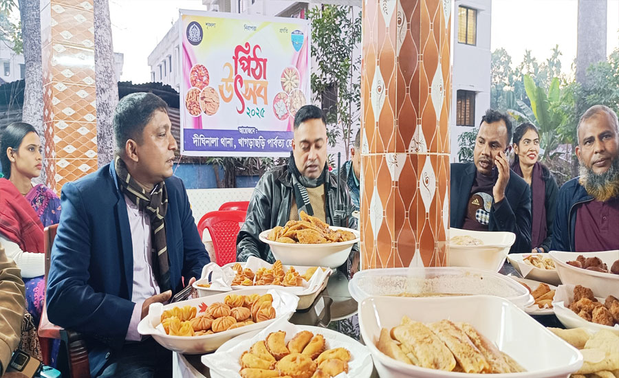 ডিউটির ফাঁকে দীঘিনালা থানায় পিঠা উৎসব