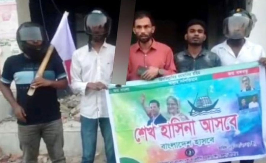 হেলমেট পরে আ.লীগের পরিত্যক্ত কার্যালয় ‘অবমুক্ত’ ঘোষণা ও পতাকা উত্তোলন